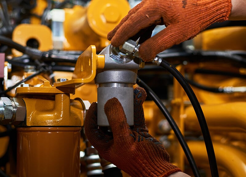 Heavy machine service filter replacement